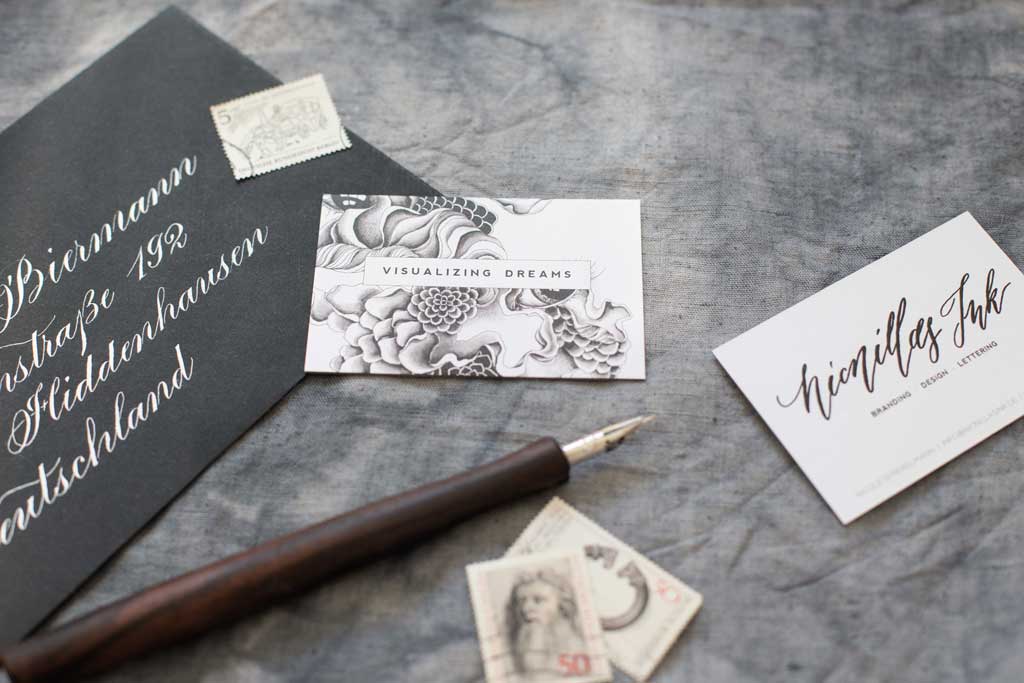 Business card design with organic illustrationsand hand lettered logo